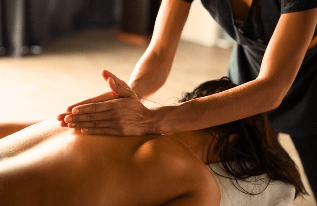 Woman receiving a gentle strokes Back Massage Chermside. Swedish Massage. What is Relaxation Massage. Brisbane Livewell Clinic