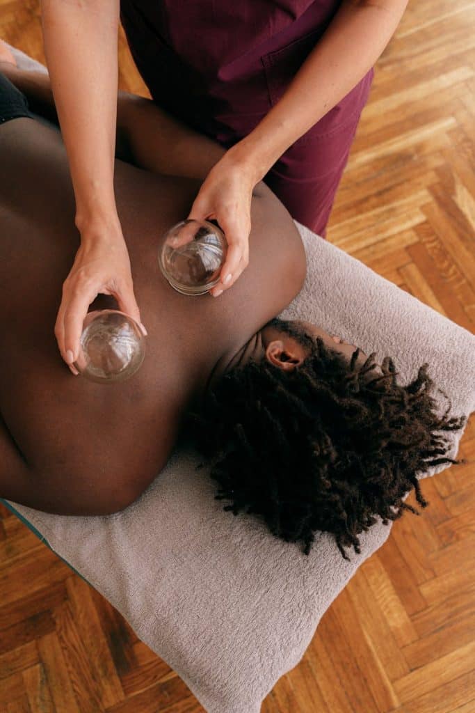 Cupping while doing Remedial Massage. Brisbane Livewell Clinic