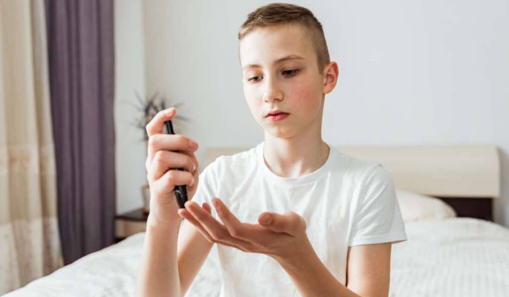 boy using Innovations to Improve Insulin. Brisbane Livewell Clinic.