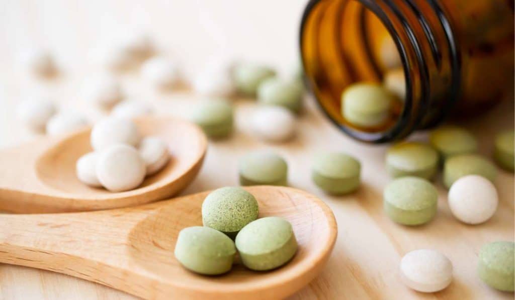 Supplements spread out on a table. Hypertension Hyperthyroidism. Brisbane Livewell Clinic