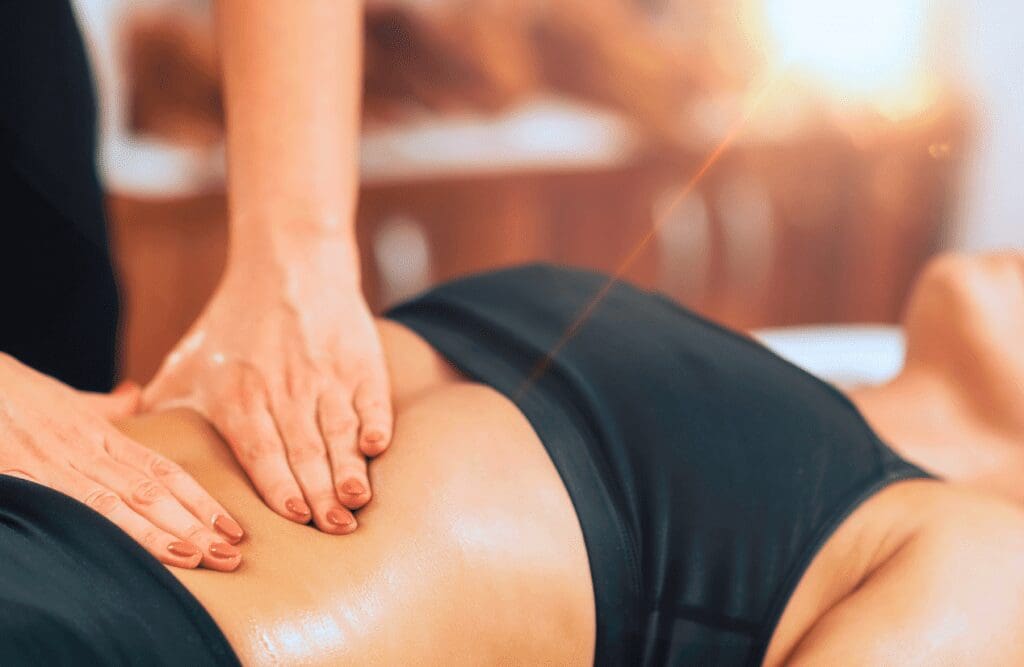 Woman receives a gentle massage. Massage Chermside West. Benefits of Bowen Technique Massage. Brisbane Livewell Clinic