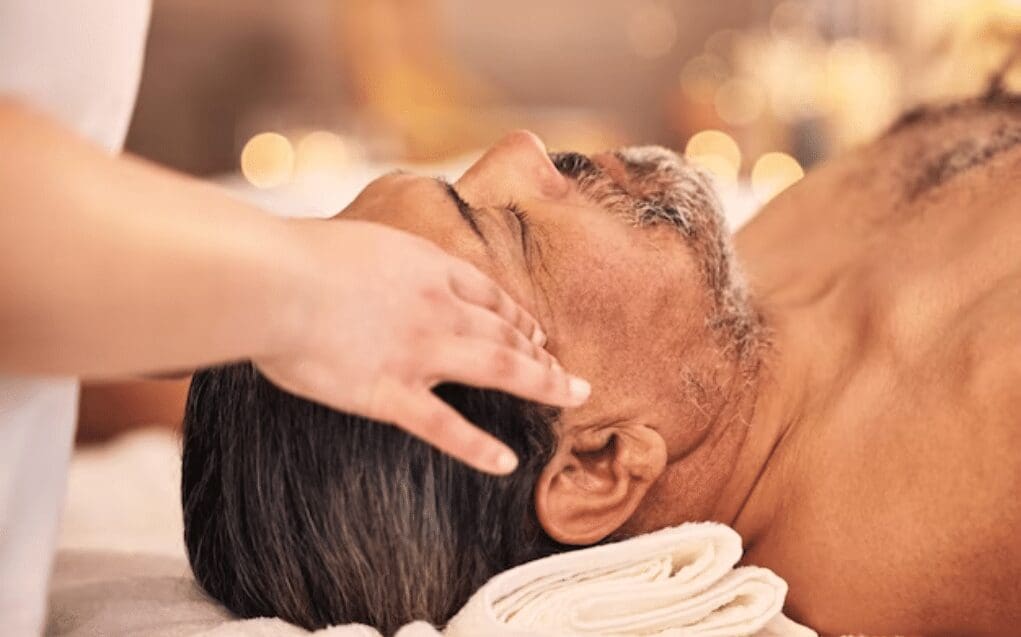 Man getting a Best Indian Head Massage Near Me. Indian Head Massage. Brisbane Livewell Clinic