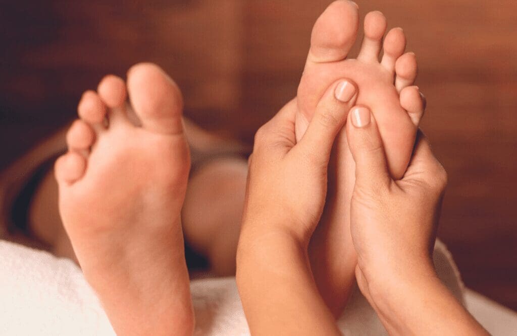 Reflexology on a male patient at Brisbane LIvewell Clinic (Wavell Heights). Try our amazing massage therapies today.