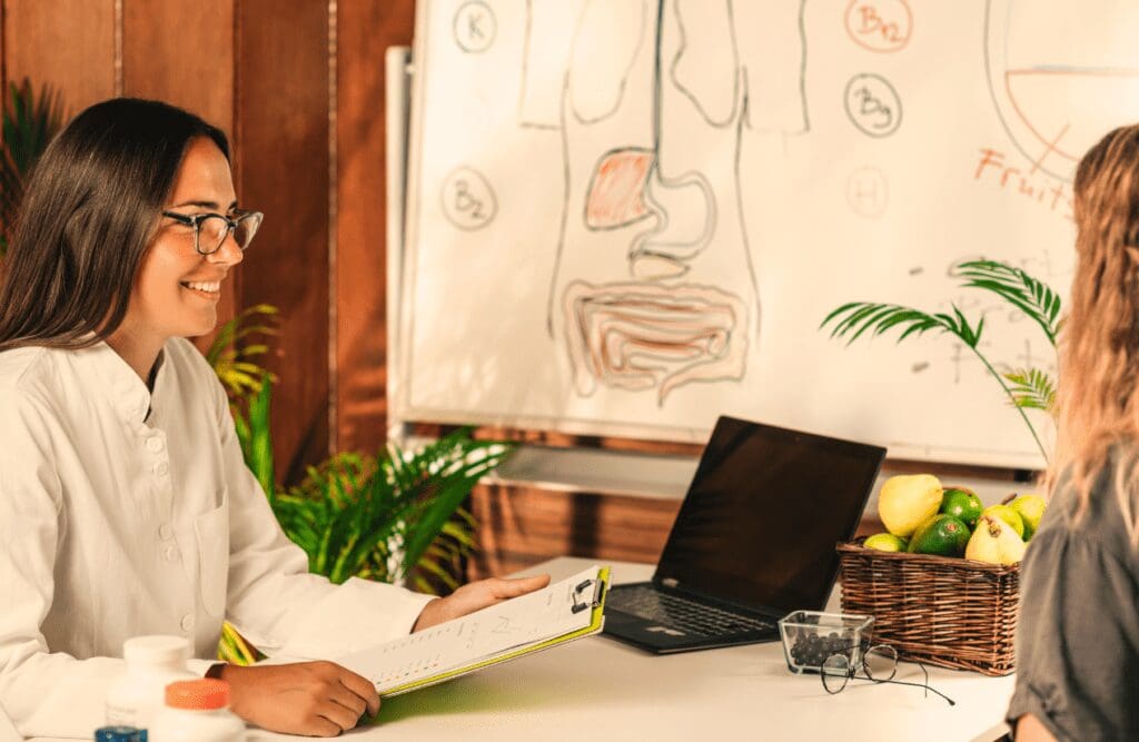 Nutritionist consulting with patient about Nutrition. Iron Deficiency. Brisbane Livewell Clinic