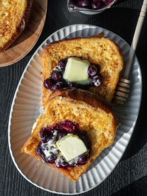 Coeliac Disease. Brown bread on white ceramic plate. Brisbane Livewell Clinic