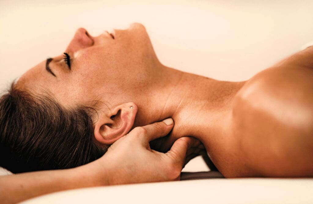 Woman receiving neck Massage Chermside West. Remedial Massage. Myofascial Release Near Me. Brisbane Livewell Clinic