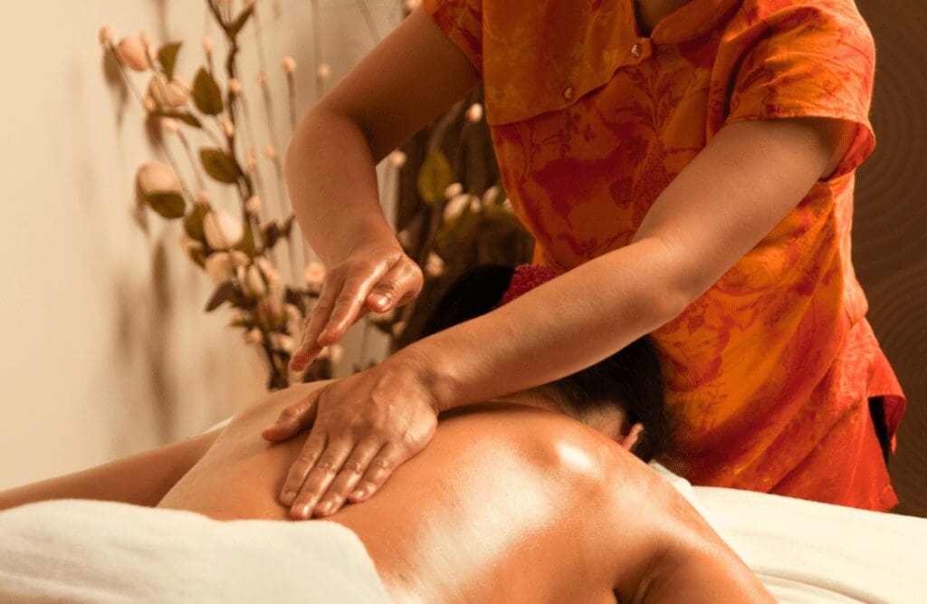 Woman receiving acuppresure during Massage Chermside West. Thai Massage. Brisbane Livewell Clinic. Full Body Massage Brisbane