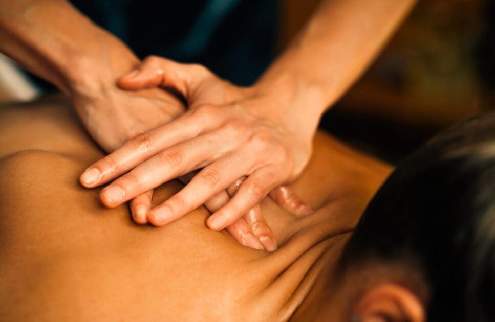 Man enjoying a therapeutic back massage. Remedial Massage Near Me. Massage Therapist Cannon Hill. Brisbane Livewell Clinic