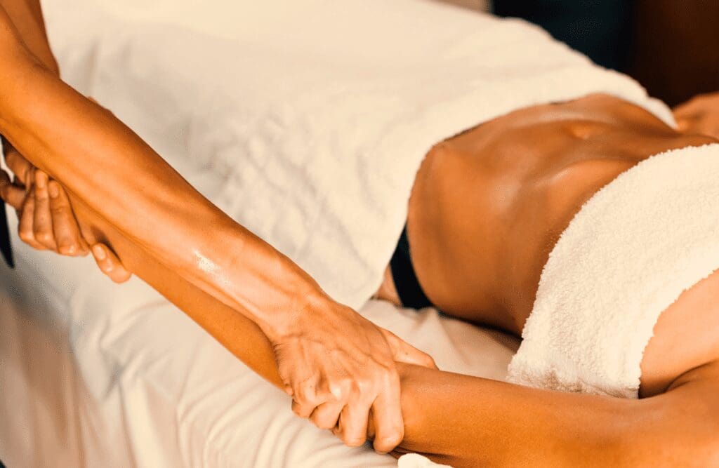 Woman receiving arm massage. Swedish Massage Brisbane. Massage Brisbane. Brisbane Livewell Clinic