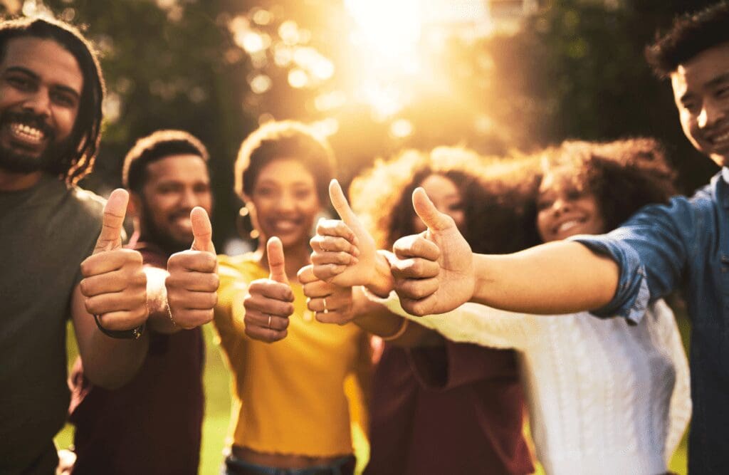 Group of friends showing thumbs up. Naturopaths. Health Screening. Brisbane Livewell Clinic