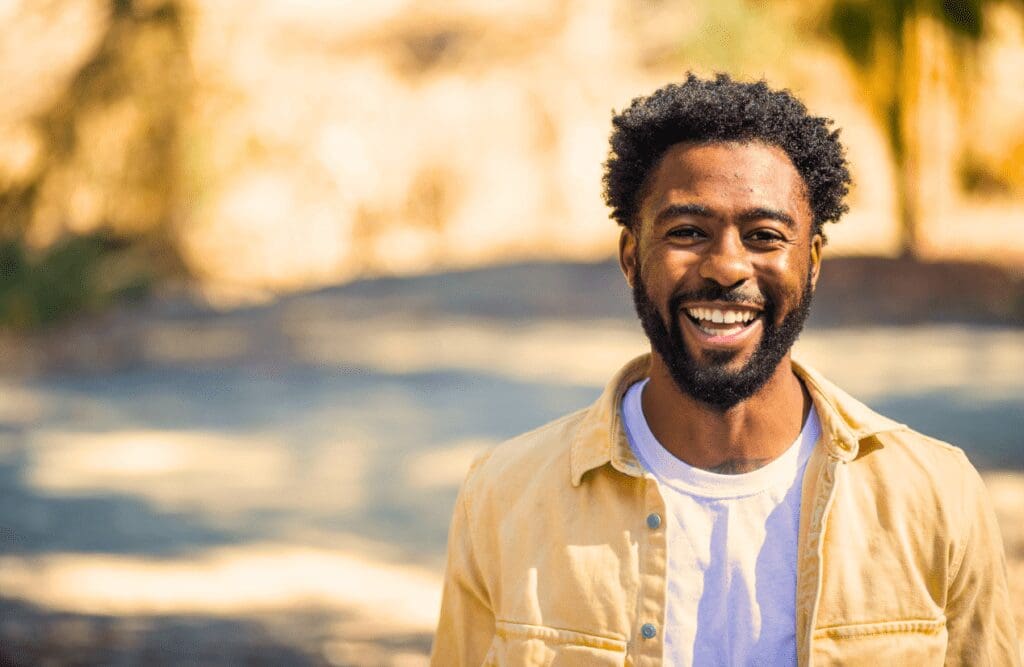 Man smiling after weight loss hypnotherapy session. Hypnotherapy Weight Loss Near Me. GERD. Holistic Counselling Brisbane. Clinical Nutritionist Murarrie. Osteopath Close to Me. Brisbane Livewell Clinic