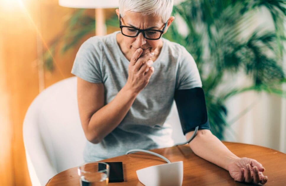 Woman checking her blood pressure. Happy Menopause. Brisbane Livewell Clinic