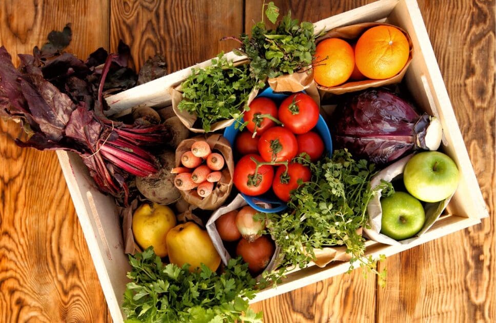 A wooden box full of fruits and vegetables. Coeliac Disease. Nicole Odlum - Clinical Naturopath and Clinical Nutritionist. Brisbane Livewell Clinic