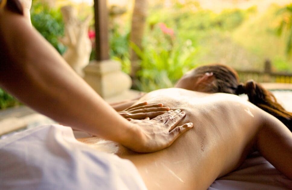 Woman receiving a body massage while enjoying the view. Massage Therapy. Full Body Massage. Massage Wavell Heights. What is Remedial Massage. Brisbane Livewell Clinic