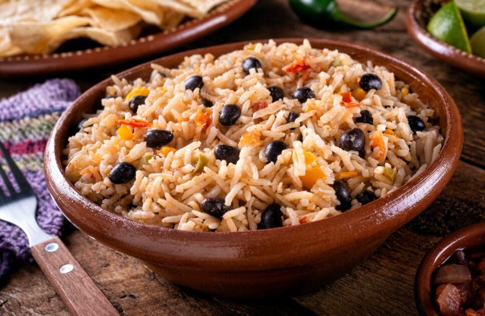 A bowl of Mexican rice mixed with black beans. Winter Wellness. Brisbane Livewell Clinic
