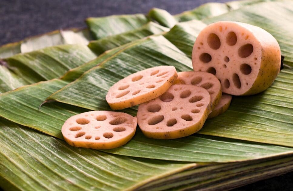 Sliced lotus root on fresh banana leaves. Plant Based Foods. Brisbane Livewell Clinic