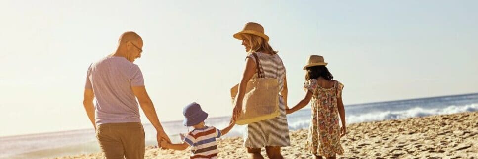 A family of four walking on the beach. How to Get an Allergy Test in Australia. Heavy Metal Detox Australia. Holistic Counselling Brisbane. Is Osteopathy the same as Physiotherapy. Brisbane Livewell Clinic