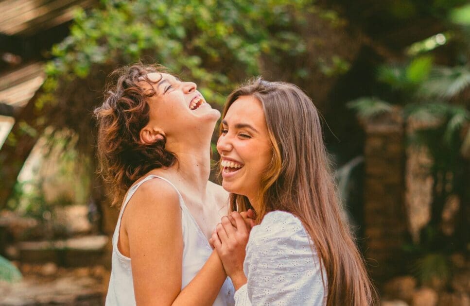 Two girl friends laughing. Therapists Brisbane. Detoxing. Bowen Therapy on the Sunshine Coast. Clinical Nutritionist Murarrie. Holistic Counselling for Disconnection. Brisbane Livewell Clinic