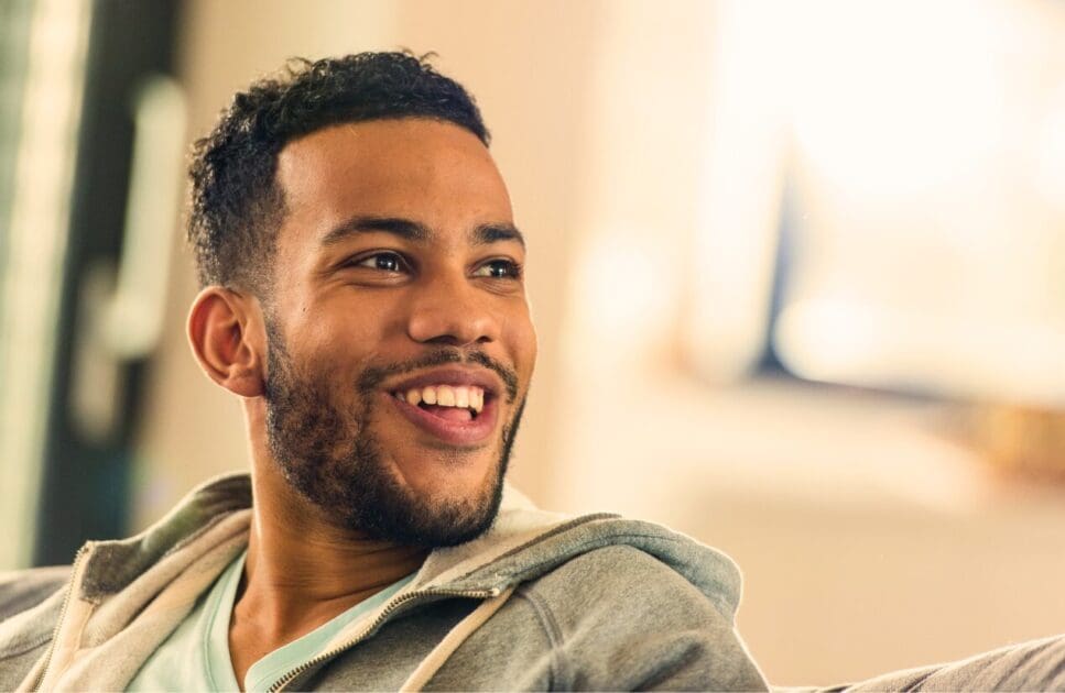 Young man smiling. Men's Health Supplements. Clinical Hypnotherapy Brisbane. What happens during Hypnotherapy. Holistic Counselling for Burnout. Brisbane Livewell Clinic