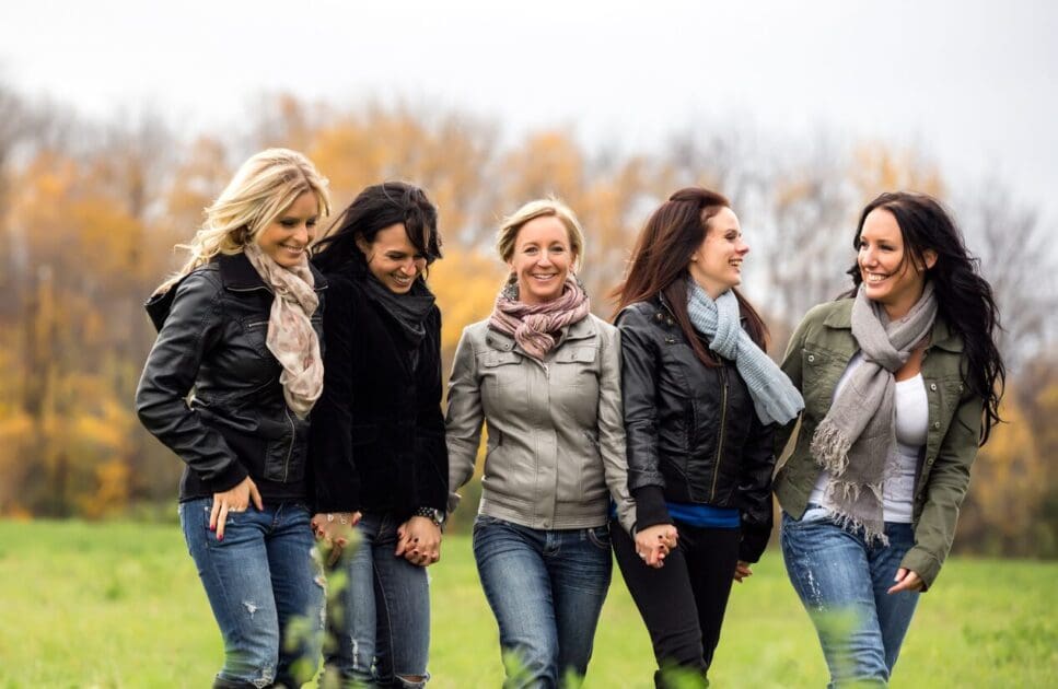 Five women walking in a field. Probiotics for Thrush. Brisbane Livewell Clinic. Naturopath herbs. Hormone Testing Brisbane. Hyperthyroidism
