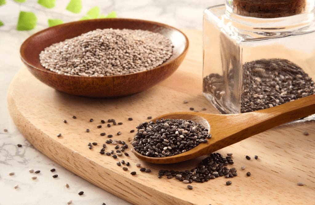 Chia seeds on wooden bowl and spoon. Fibre. Brisbane Livewell Clinic