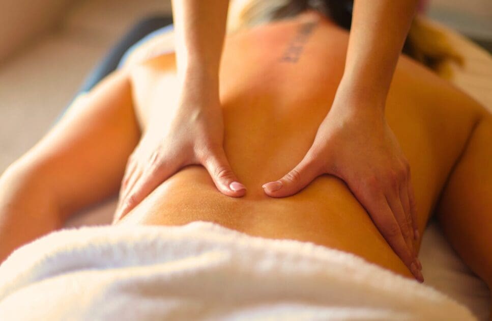 Woman receives a relaxing back massage. Relaxation Massage Near Me. Remedial Massage. Brisbane Livewell Clinic