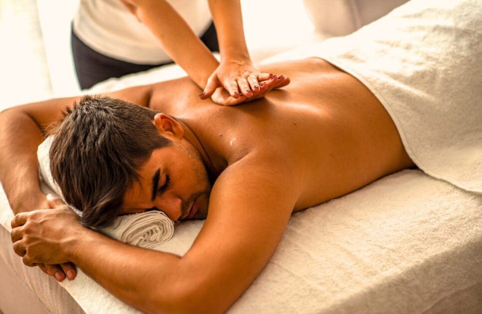 Man receiving therapeutic massage. Relaxation Massage Near Me. Massage Brisbane Northside. Brisbane Livewell Clinic