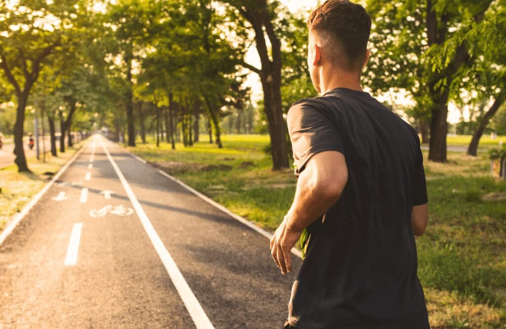 Young man going for a morning run. Hypnosis in Sydney. Osteopath Carindale. Brisbane Livewell Clinic