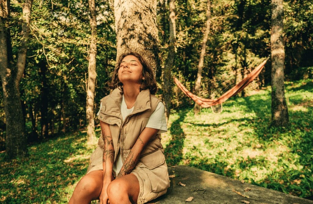 Woman enjoying a stress-free environment. Naturopaths. Osteopath for Shoulder Pain. Brisbane Livewell Clinic