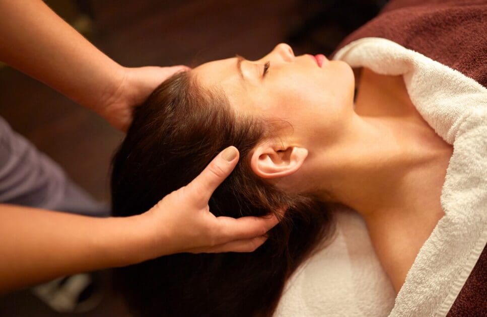 Woman having head massage at spa. Brisbane Livewell Clinic