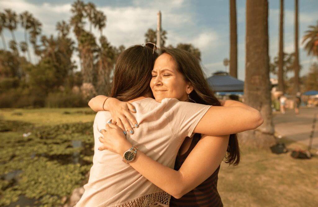 Two women hugging each other. Gut brain connection. Brisbane Livewell Clinic