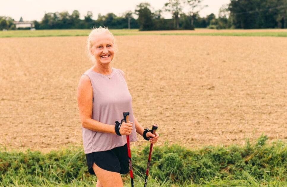 Middle-aged woman hiking outdoors. Menopause Clinic Near Me. Naturopath and Wellness Clinic. Osteopath Tingalpa. Brisbane Livewell Clinic