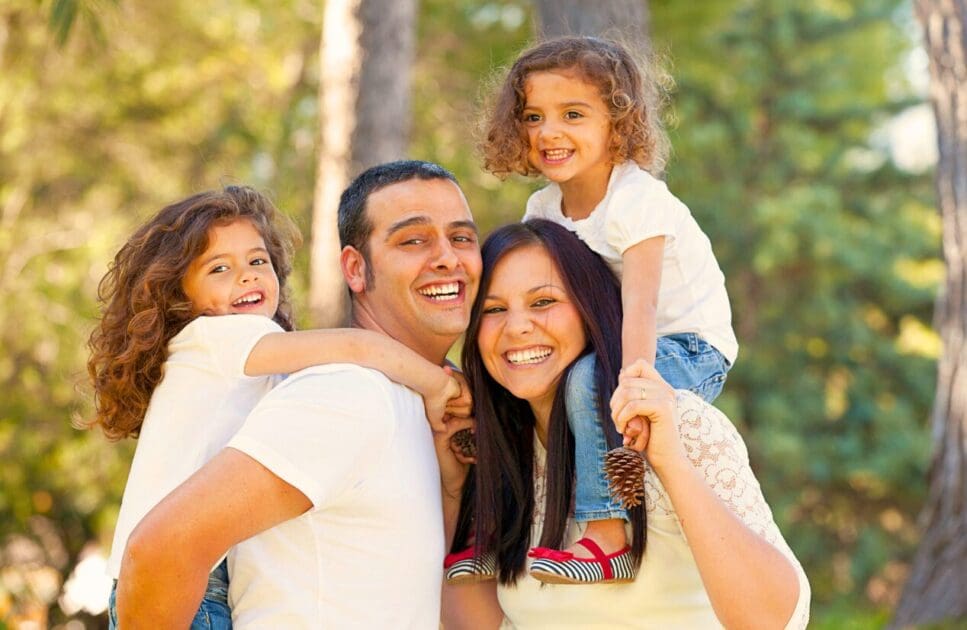 Family enjoying time together in the park. Dry Needling Near Me. Mindset Therapy Near Me. Quit Smoking Hypnosis Calculator. Brisbane Livewell Clinic