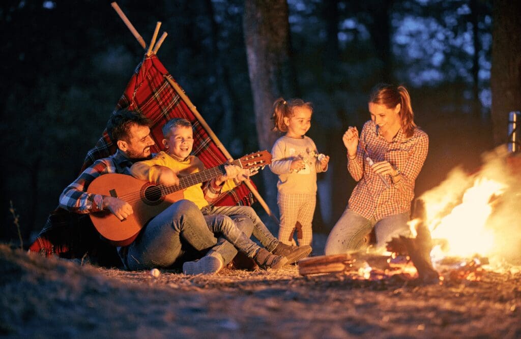 Family enjoying campfire together. Hypnotherapy Wavell Heights. Brisbane Livewell Clinic