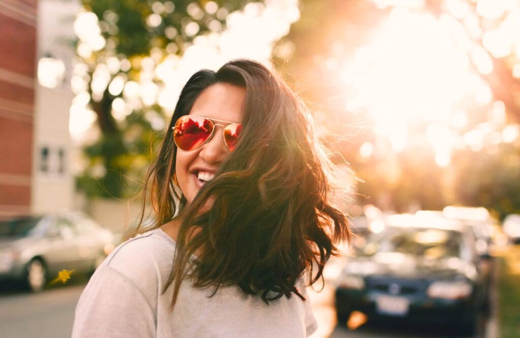 Woman enjoying outdoors during sunny day. Clinical Hypnotherapy Seven Hills. Naturopathic Practitioner. Brisbane Livewell Clinic