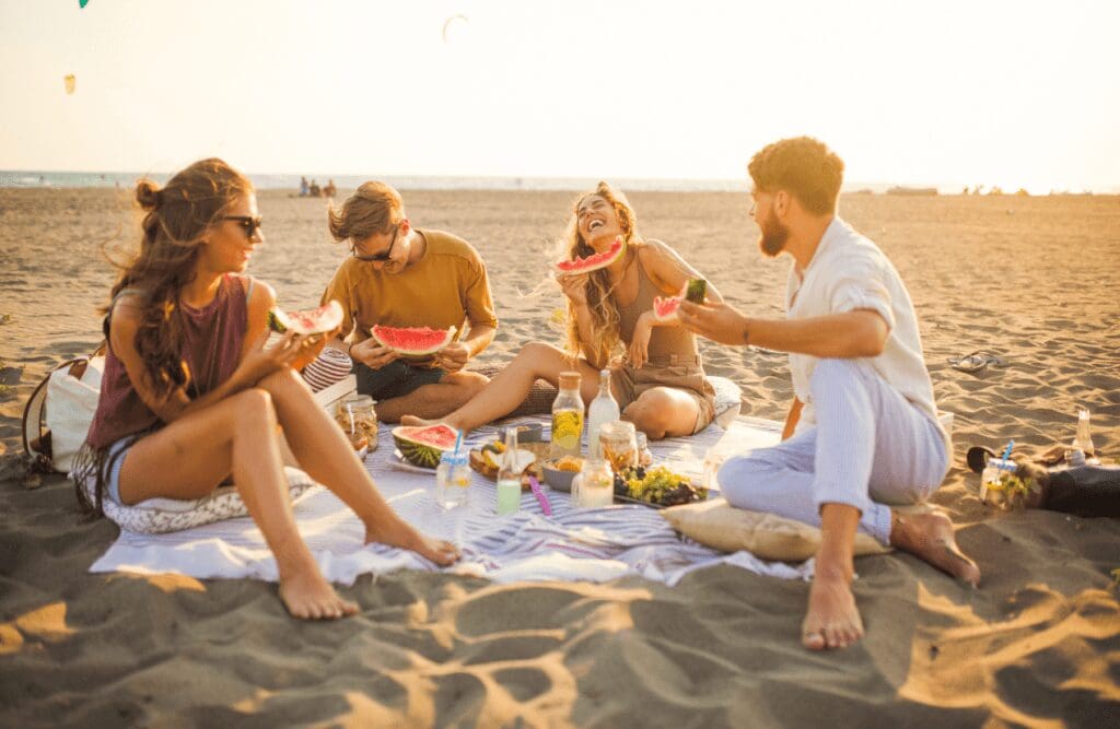 Friends on a beach picnic. Hypnotherapy Wavell Heights. I Need Mentoring That Understands How I Think. Brisbane Livewell Clinic