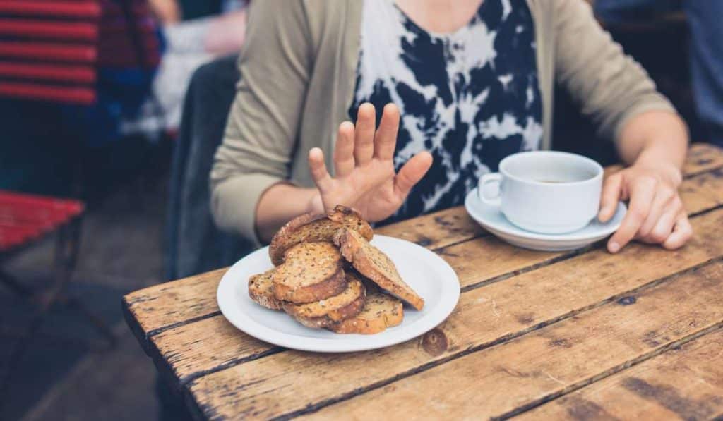 Women avoid eating due to Coeliac Disease. Brisbane Livewell Clinic.