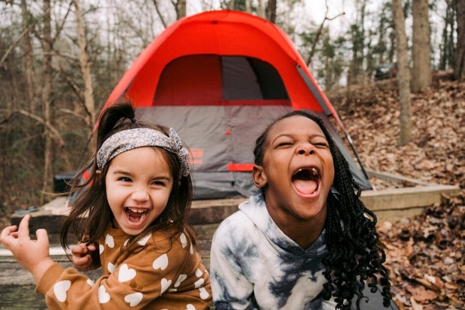 Two young girls standing next to a tent. Gut Health Specialist Brisbane