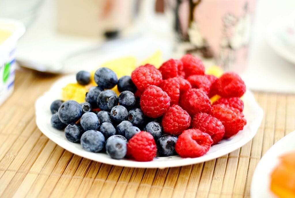 Strawberries and blue berries on a plate. Heavy Metal and Detox. Brisbane Livewell Clinic