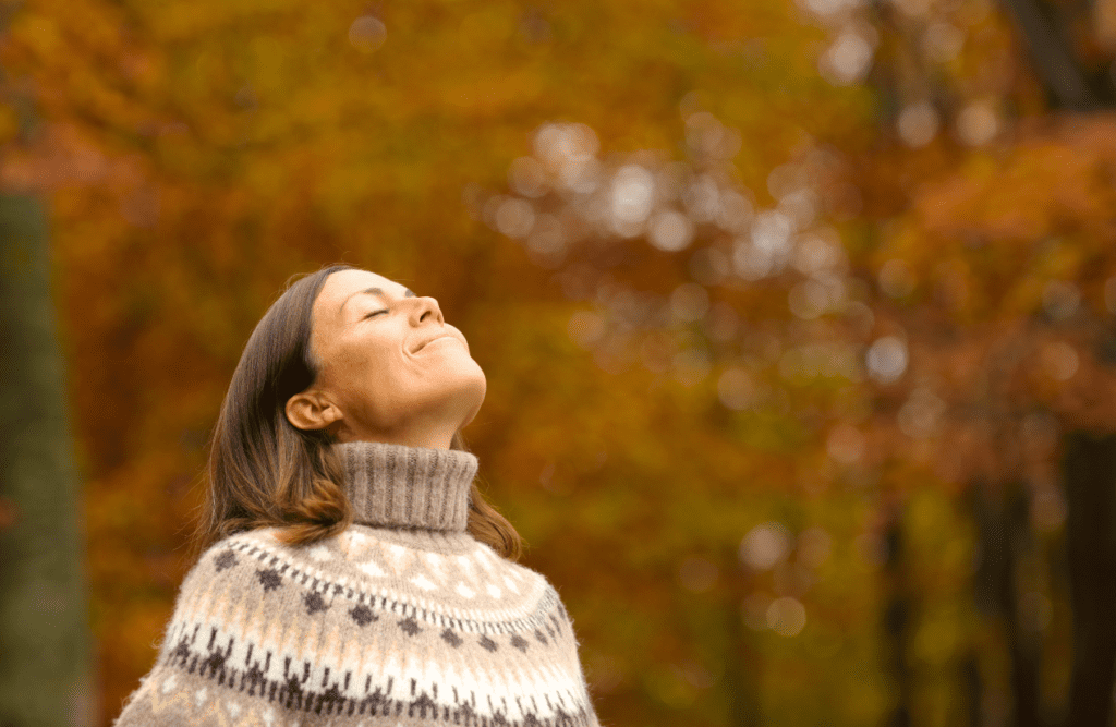 Woman breathing deep fresh air. Brisbane Wellbeing. Hayfever. Brisbane Livewell Clinic
