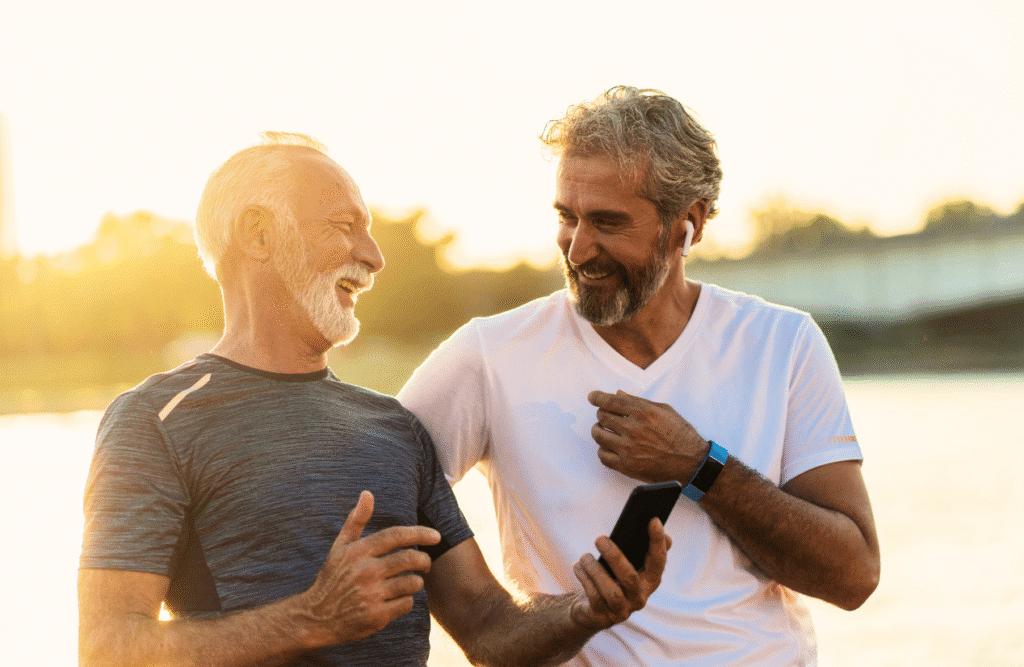 Two men around 60's smiling and laughing together outdoors. Men's Health Supplements. Hypnotherapy Services in Brisbane. Hypnotherapy Brisbane. Hypnotherapy. Hypnosis to Stop Smoking. Brisbane Livewell Clinic