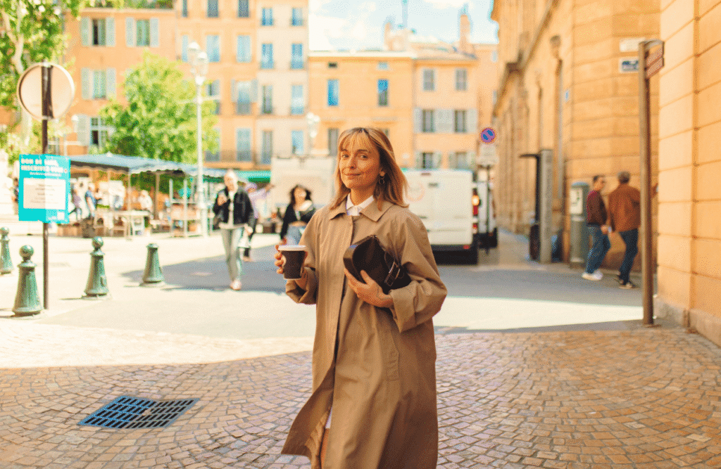 Woman walking with a cup of coffee. Brisbane Wellbeing. Menopause. Thyroid worse in winter. Is Osteopathy Good for Back Pain. Brisbane Livewell Clinic