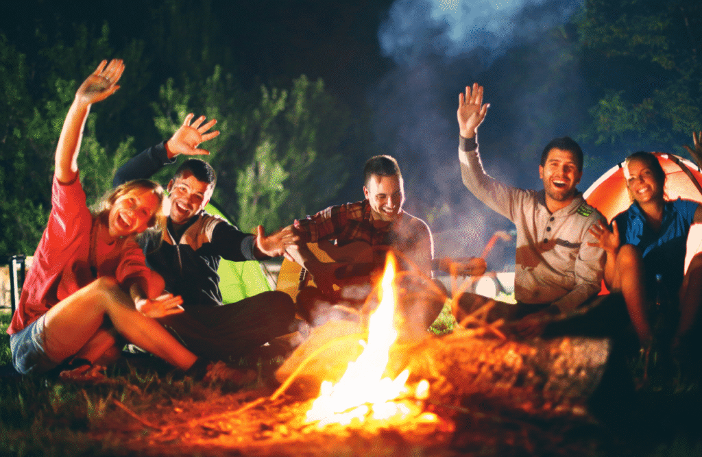 group of friends gathered around a campfire. ADHD Naturopath. Brisbane Livewell Clinic