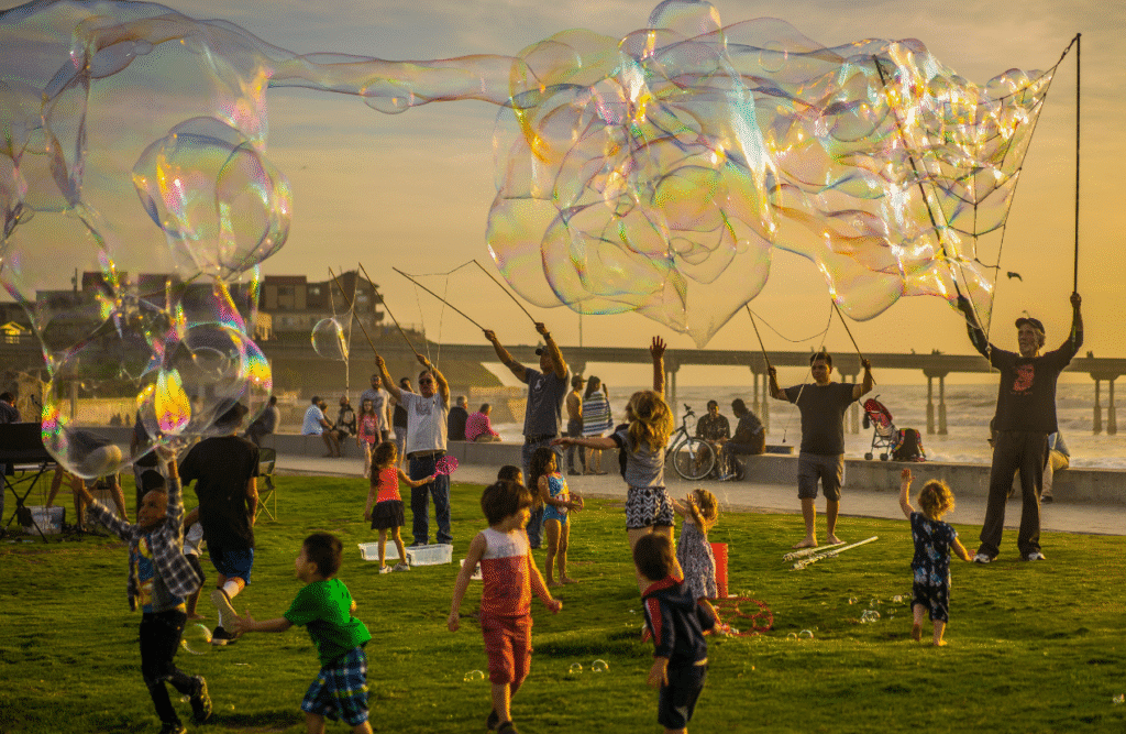 Children playing with bubbles in the park. ADHD Naturopath. Bridgeman Downs. Brisbane Livewell Clinic
