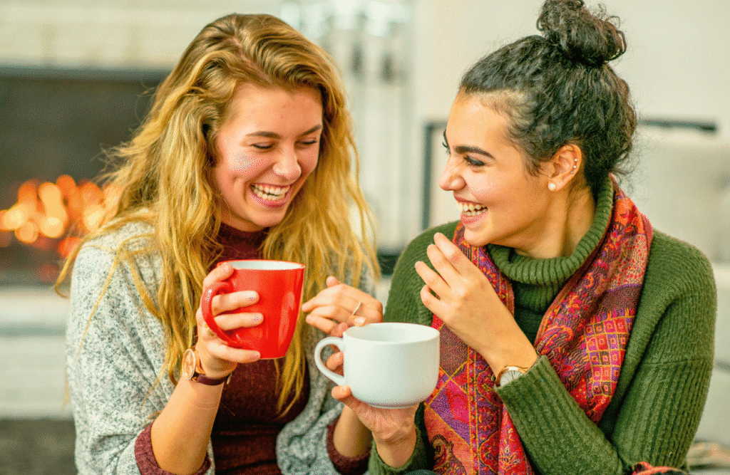 Two women sitting on a couch, enjoying coffee together. Clinical Nutrients. Heavy Metal Detox. Happy Menopause. Naturopath herbs. About us. DUTCH Hormone Testing Near Me. Hyperthyroidism. Heavy Metal Detox Australia. Addiction Hypnotherapy. Relief from Menopausal Symptoms with Naturopathy