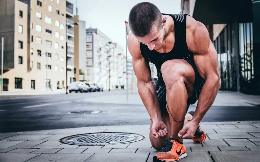 Man tying his shoes during a running session. Genetic Methylation Testing and DNA Health Testing at Brisbane Livewell Clinic