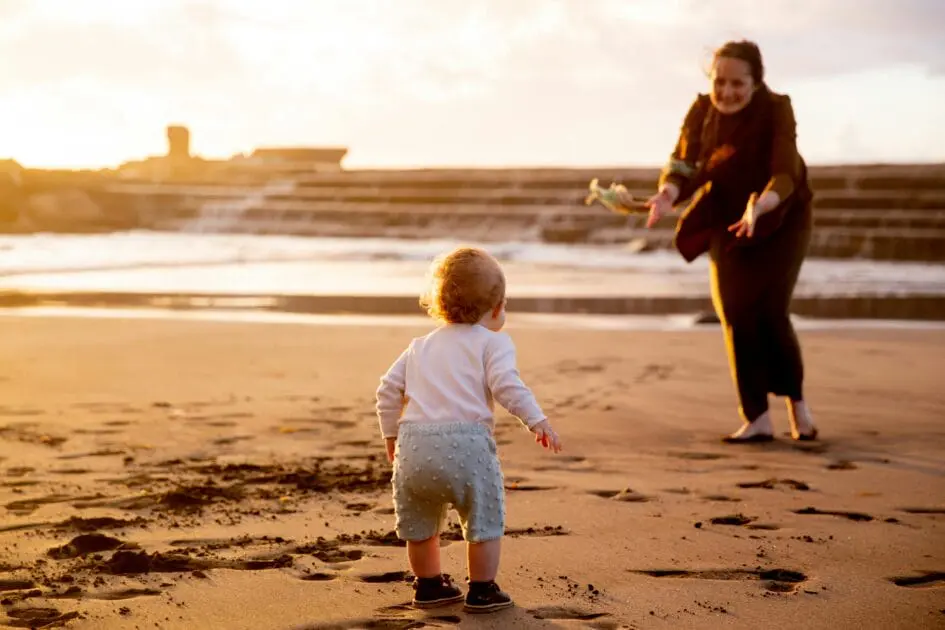 Child running towards her mother on the shore. Counselling Camp Hill. Clinical Hypnotherapy. Brisbane Livewell Clinic