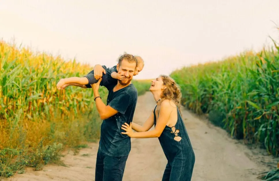 Family having fun at the cornfield during sunny day. Lymph Drainage. Family Counselling. Brisbane Livewell Clinic
