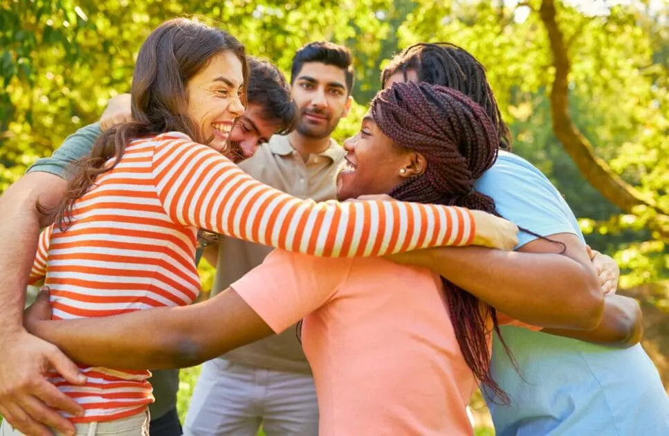 Group of friends hugging each other. Counselling the Bereaved. Holistic Counselling for Adults Who Feel They Don't Belong. Hypnosis for Anxiety. Brisbane Livewell Clinic