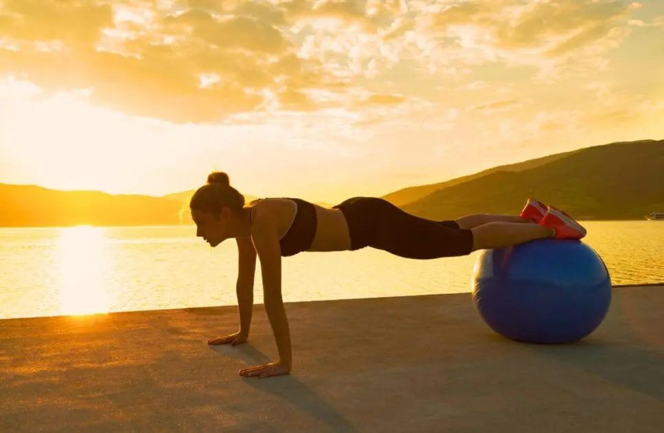 Woman exercising outdoors. Controlling Constipation and Bloating. Osteopath Carindale. Brisbane Livewell Clinic
